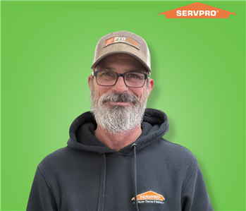 male employee wearing a black SERVPRO hoodie